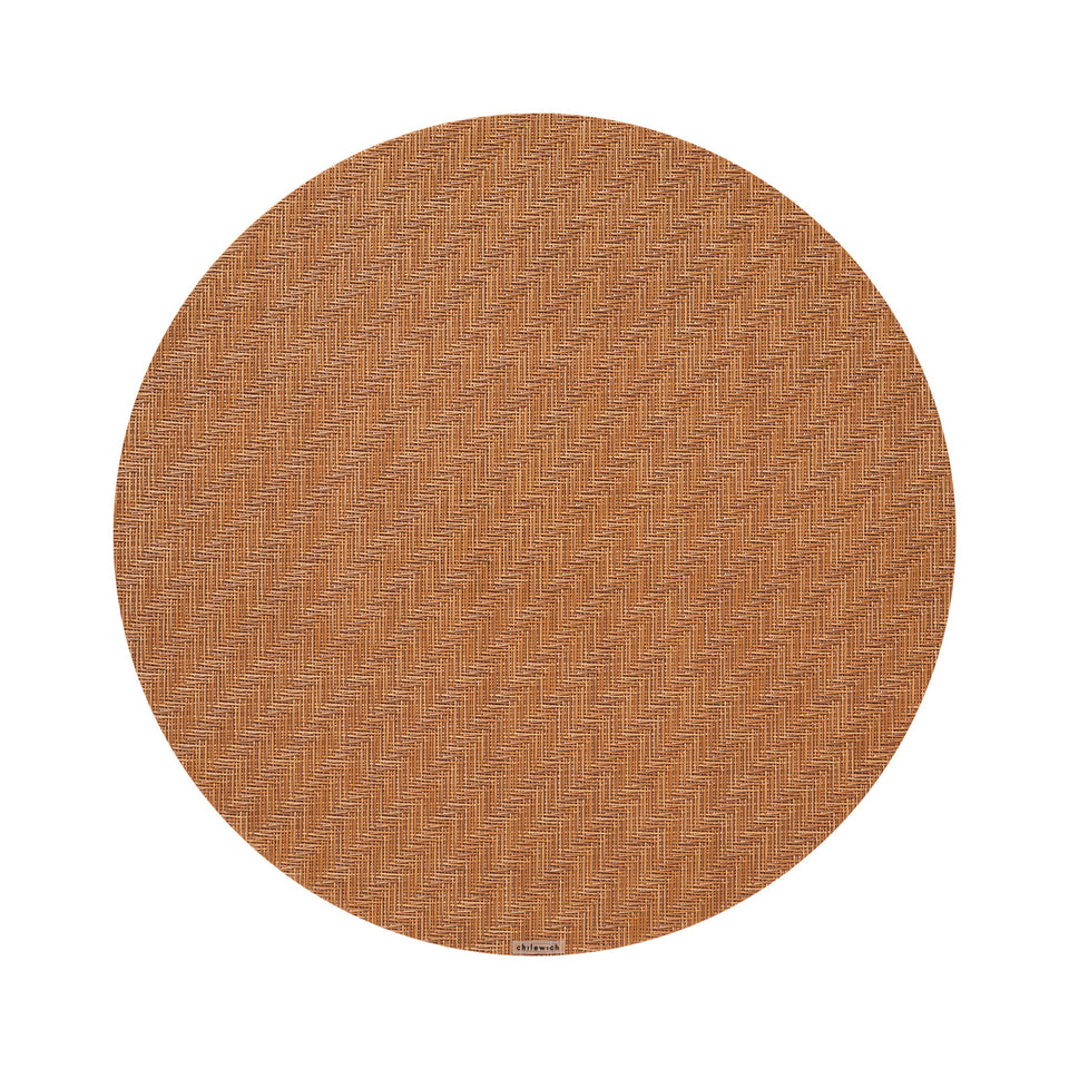 Chilewich Foxtail round placemat in Honey, viewed from above on a white background
