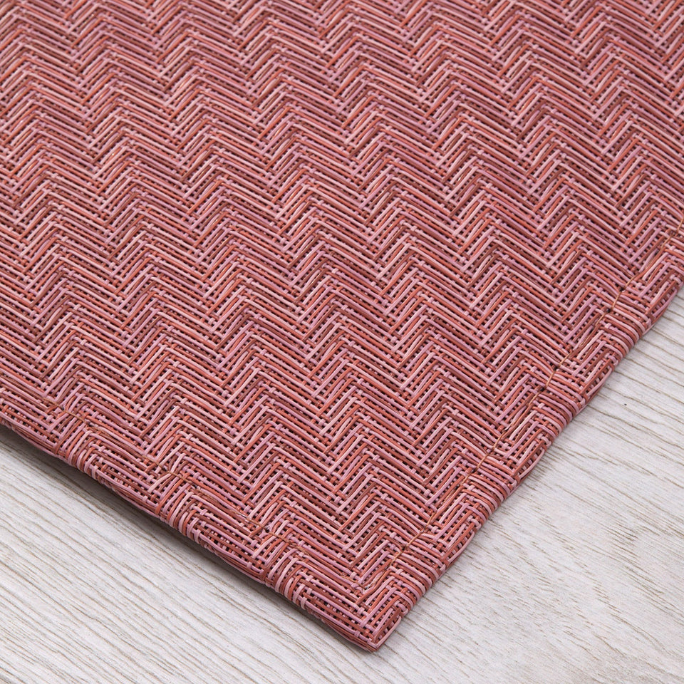 Foxtail / Raspberry woven floor mat by Chilewich, interior setting