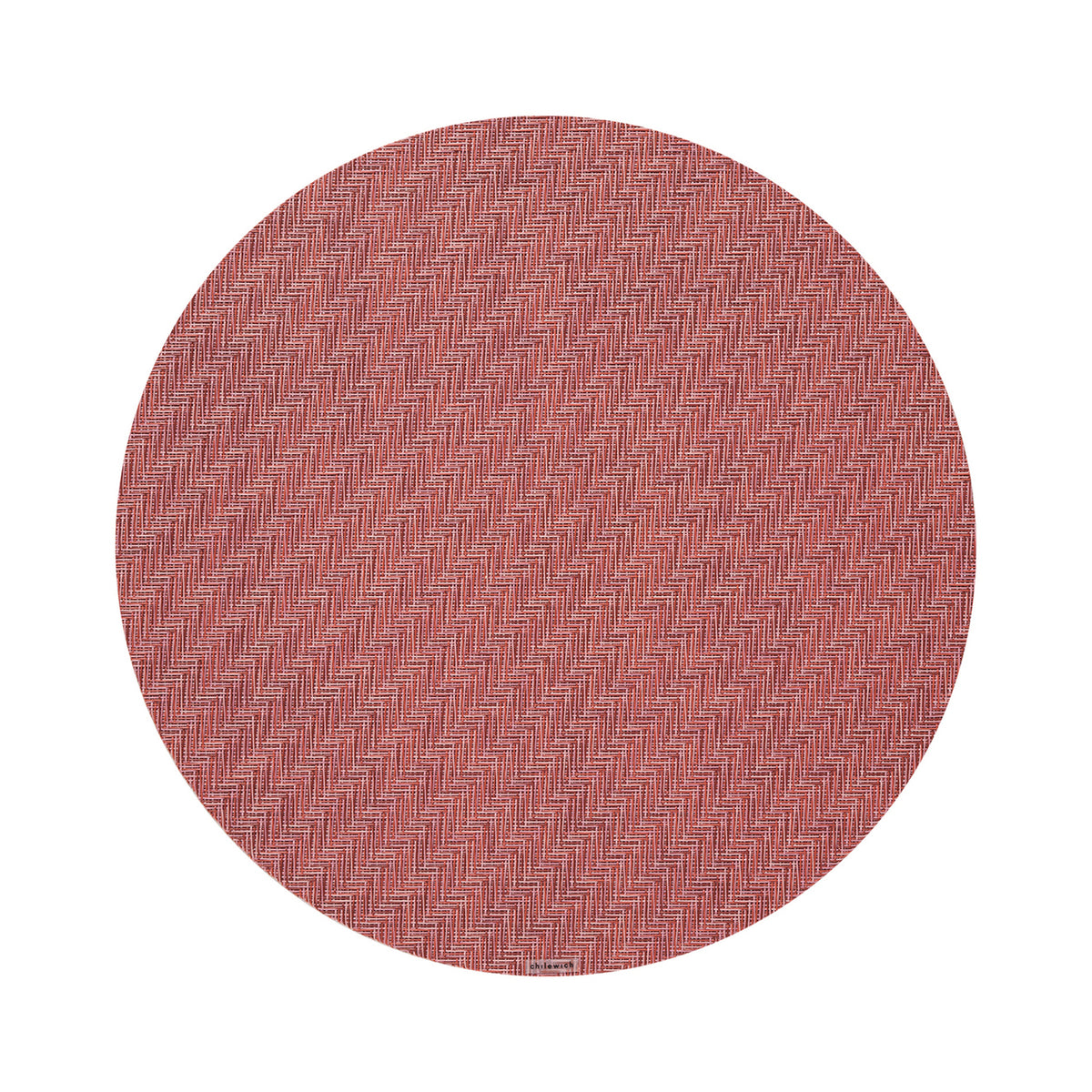 Chilewich Foxtail round placemat in Raspberry, viewed from above on a white background