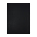 Mini Basketweave / Black woven floor mat by Chilewich, studio view