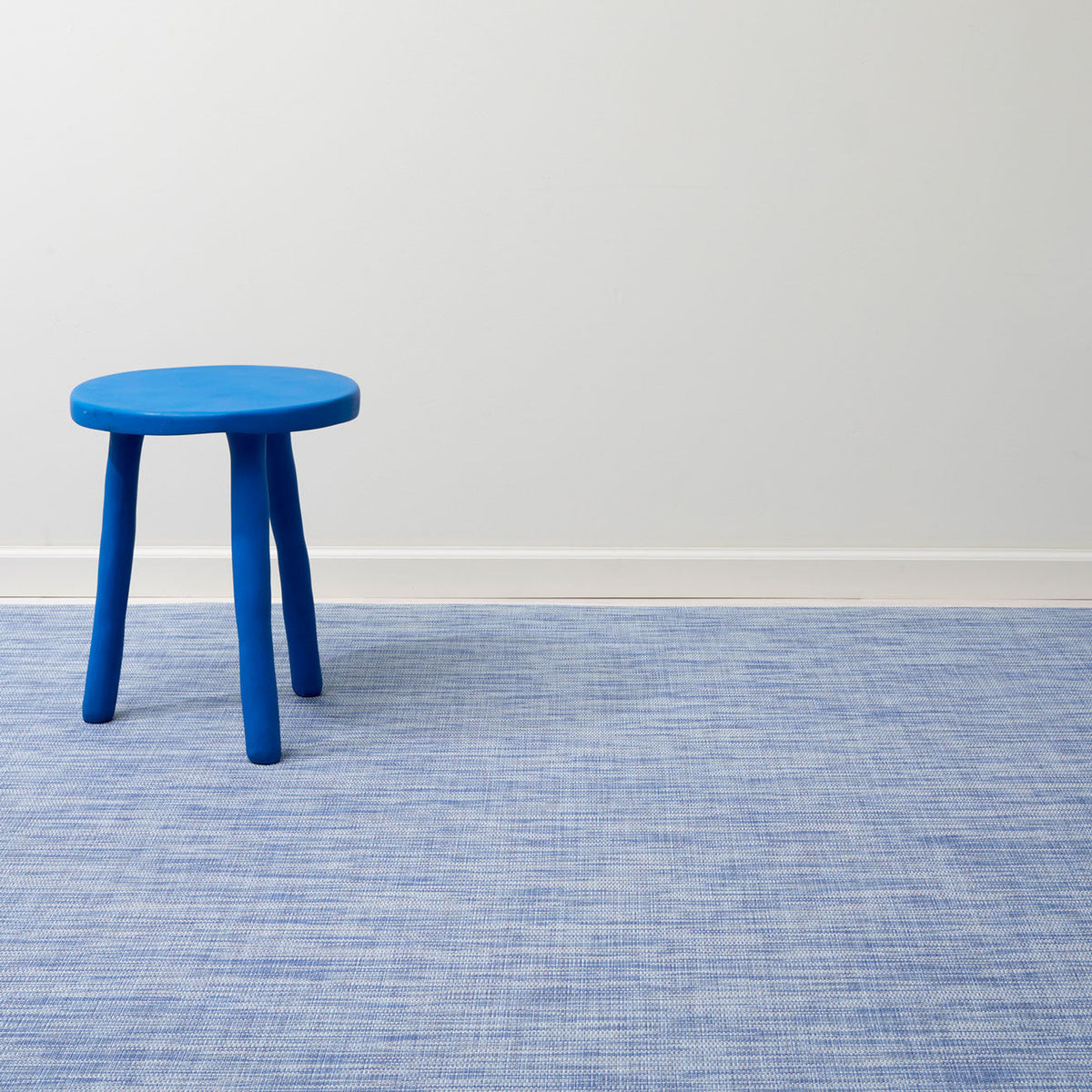 Mini Basketweave / Chambray woven floor mat by Chilewich, interior setting
