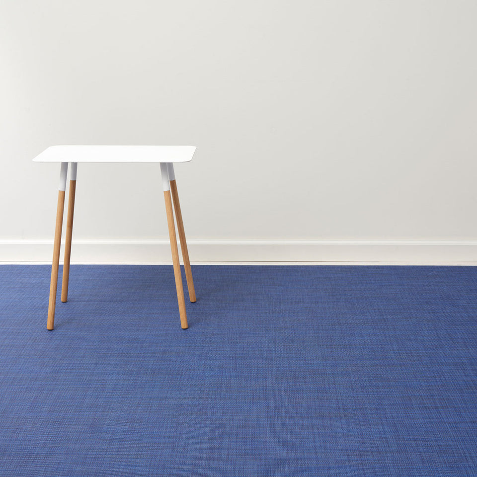 Mini Basketweave / Indigo woven floor mat by Chilewich, interior setting