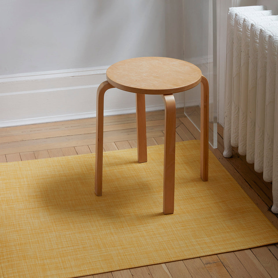 Mini Basketweave / Ochre woven floor mat by Chilewich, interior setting