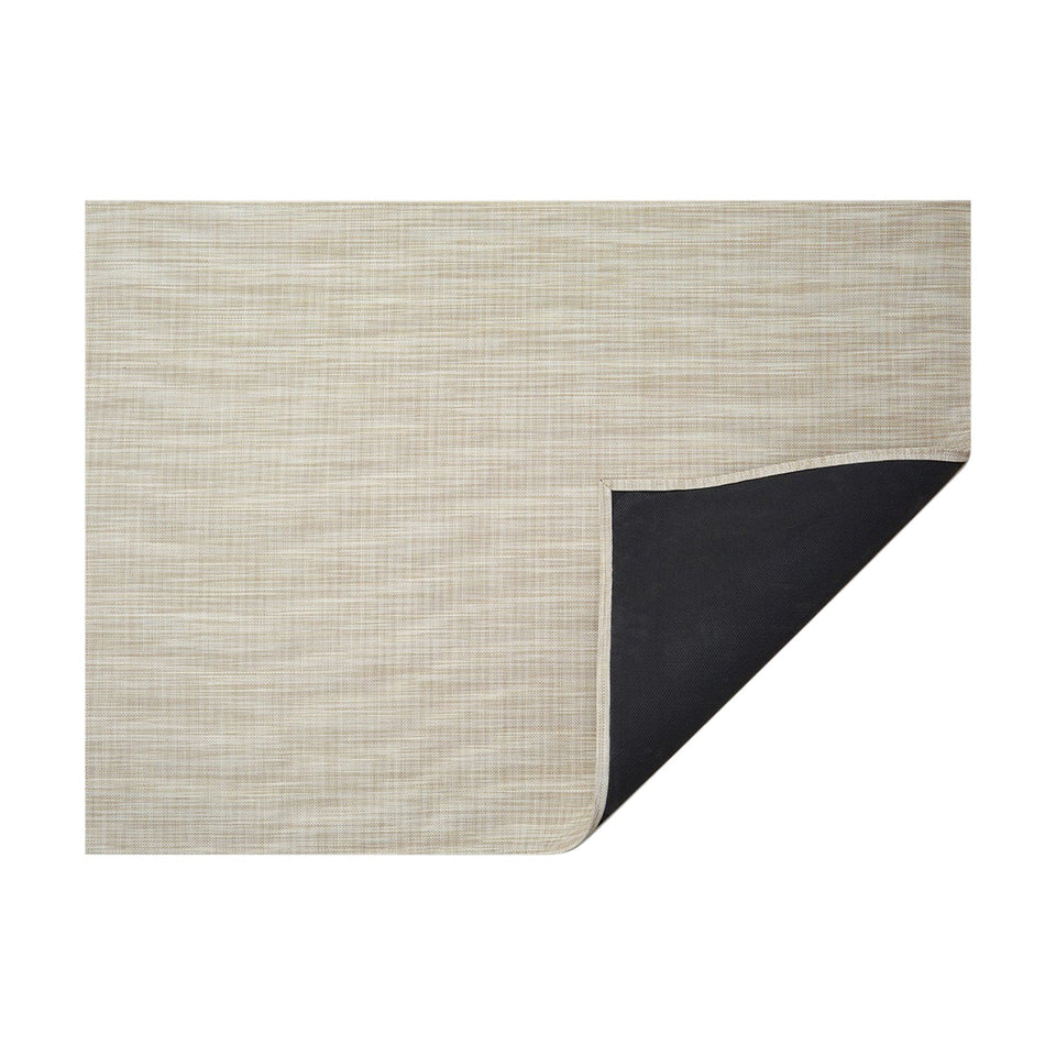 Parchment Mini Basketweave woven floor mat by Chilewich, horizontal folded-corner view