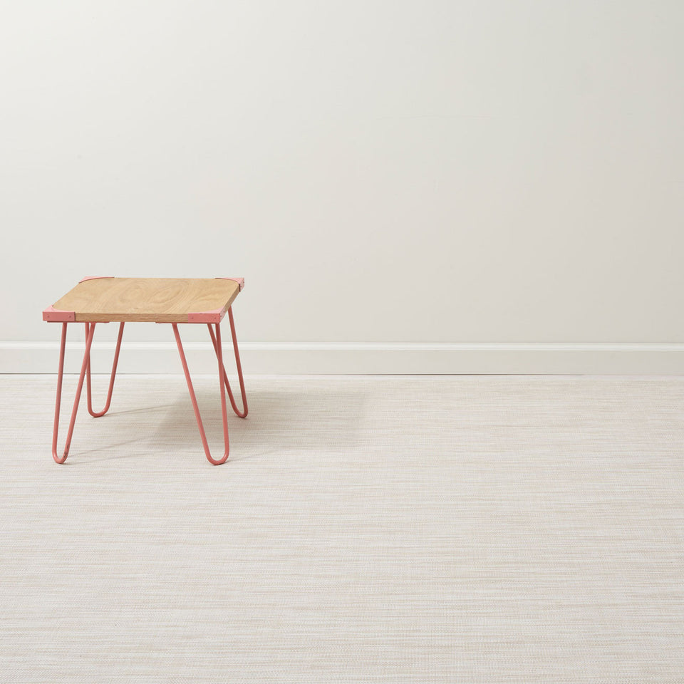 Mini Basketweave / Parchment woven floor mat by Chilewich, interior setting