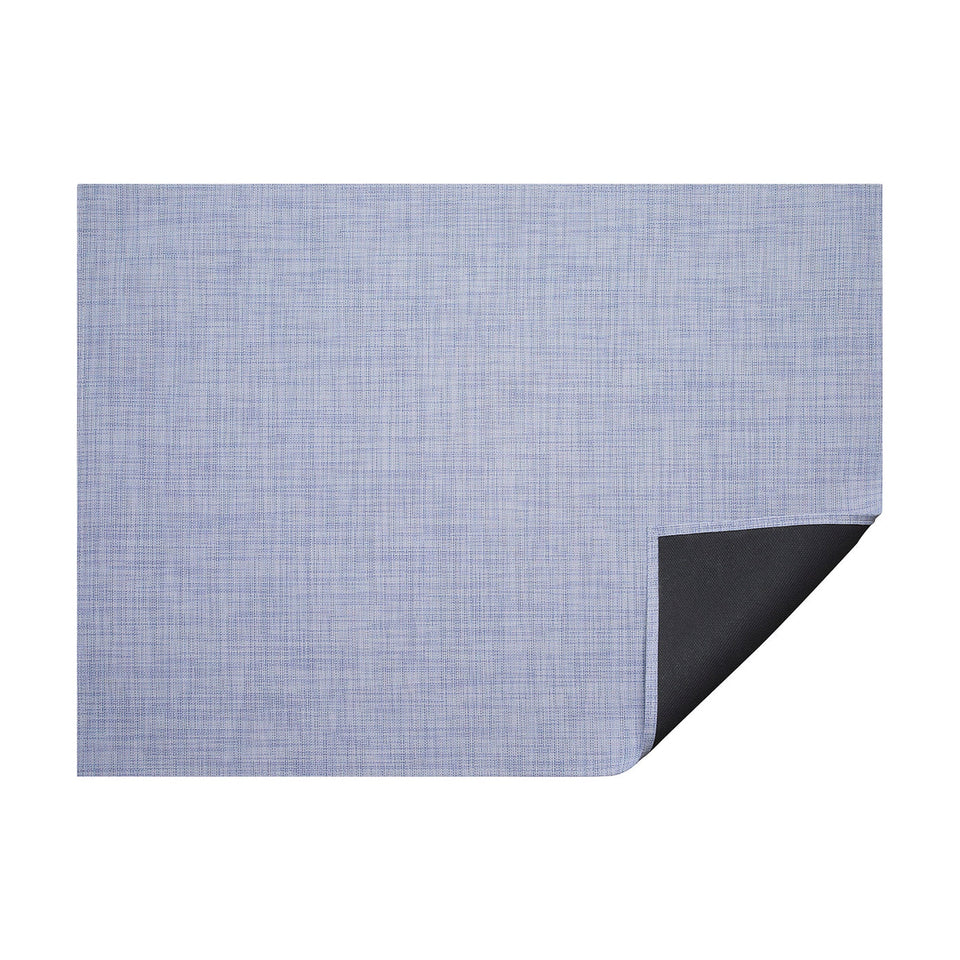 Periwinkle Mini Basketweave woven floor mat by Chilewich, horizontal folded-corner view