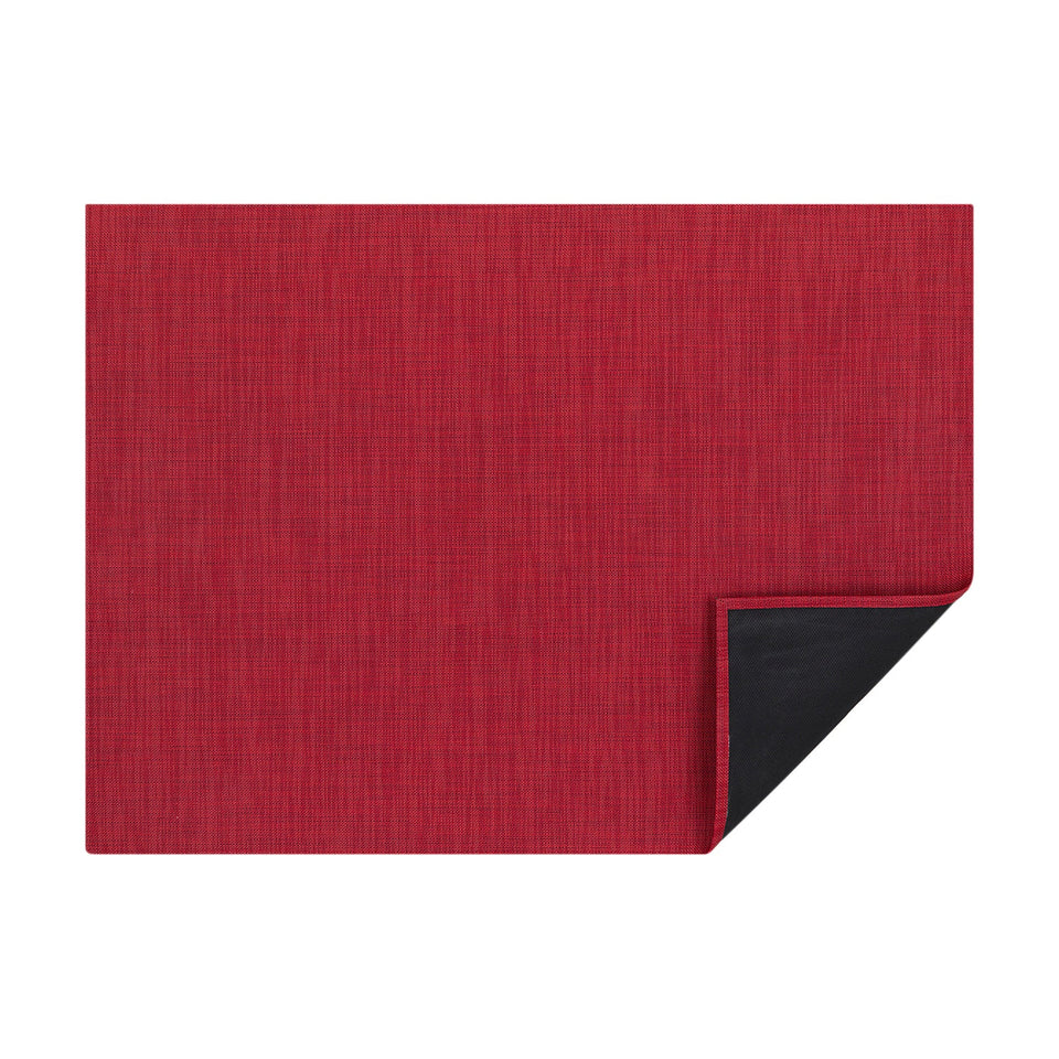 Scarlet Mini Basketweave woven floor mat by Chilewich, horizontal folded-corner view