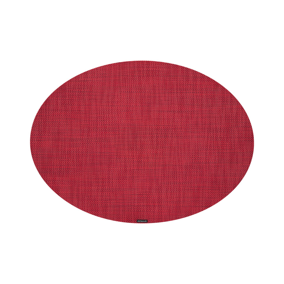Chilewich Mini Basketweave oval placemat in Scarlet, viewed from above on a white background