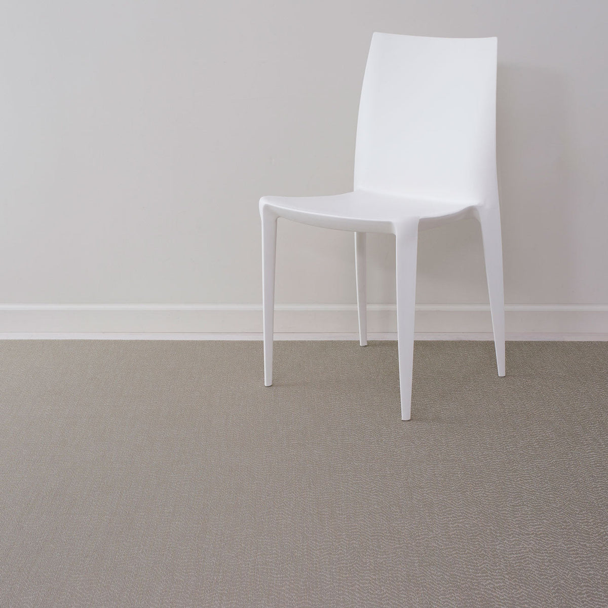 Moiré / Mica woven floor mat by Chilewich, interior setting