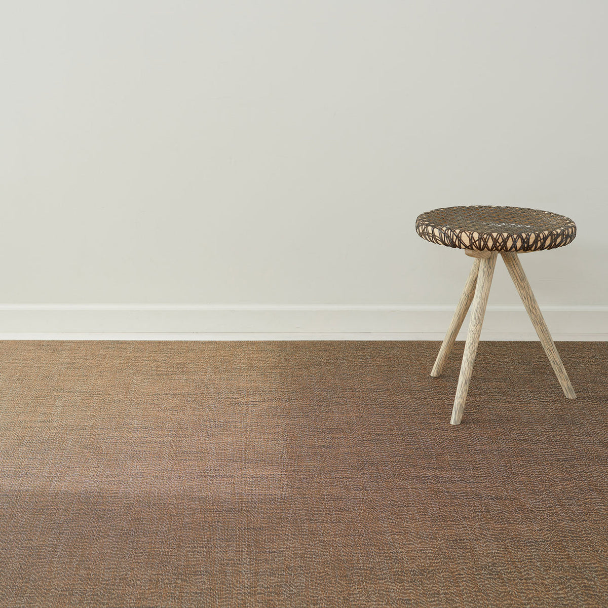 Moiré / Mocha woven floor mat by Chilewich, interior setting