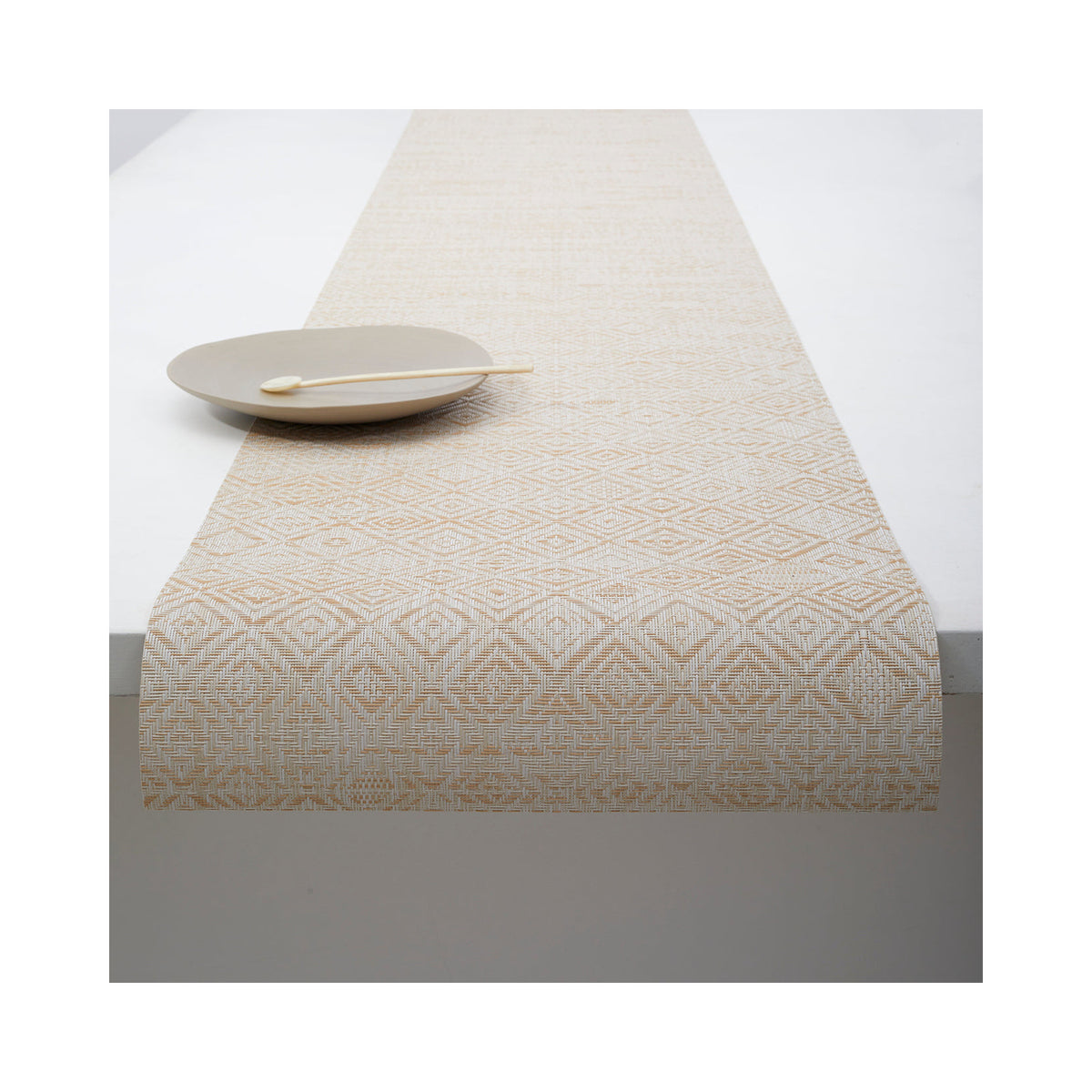 Chilewich Mosaic table runner in Almond, draped across a table