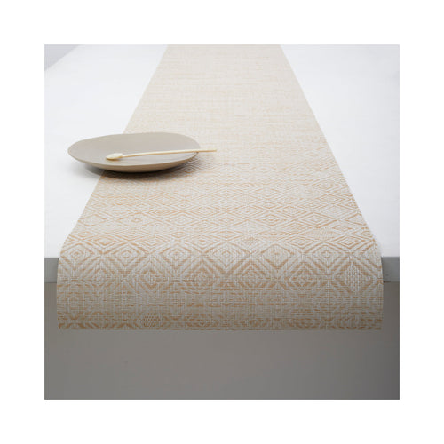 Chilewich Mosaic table runner in Almond, draped across a table