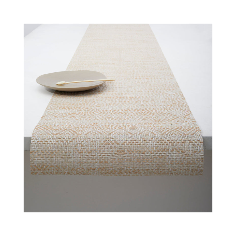 Chilewich Mosaic table runner in Almond, draped across a table