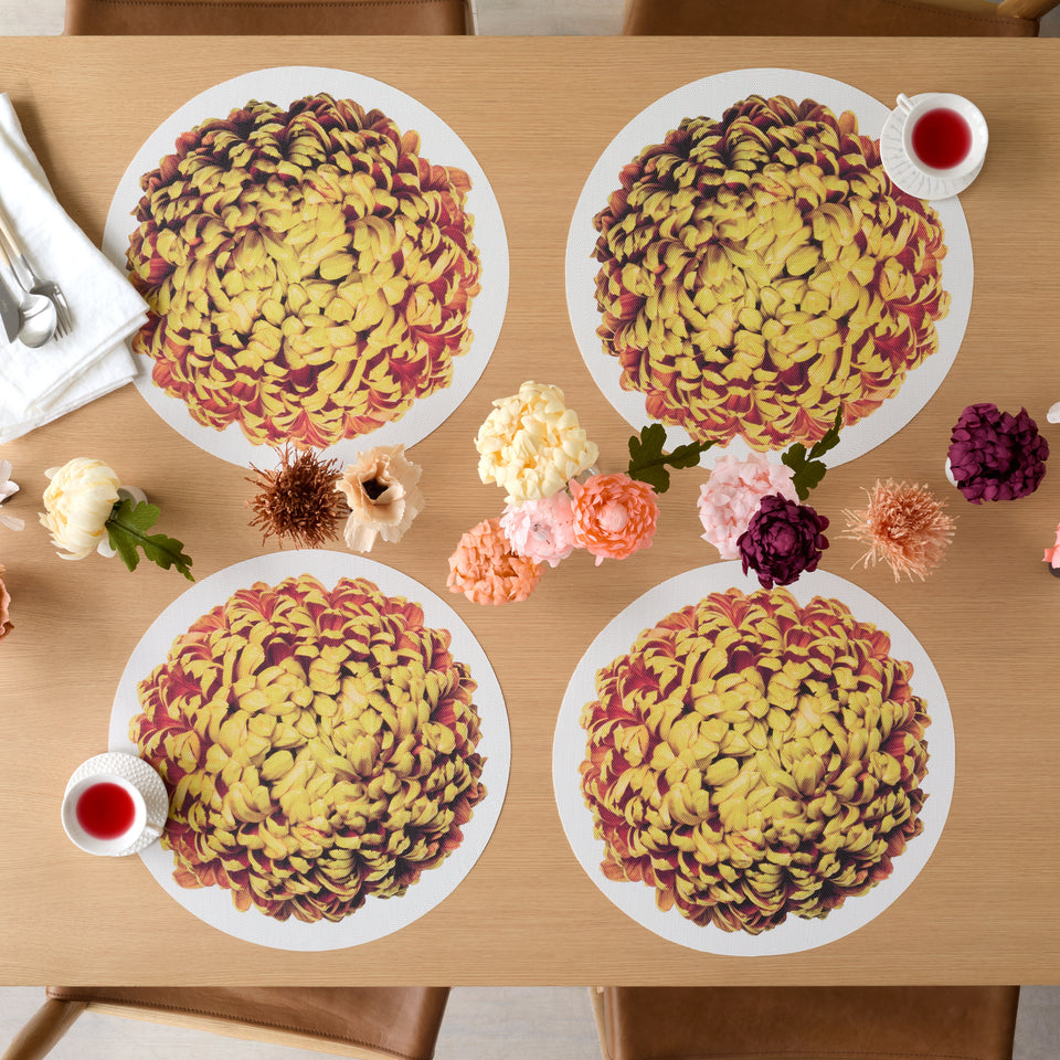 Chilewich Mums in Amber, shown in a styled table setting