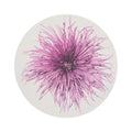 Chilewich Mums round placemat in Plum, viewed from above on a white background