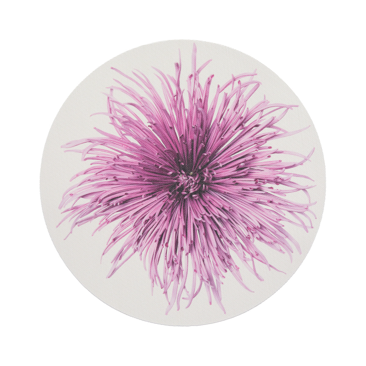 Chilewich Mums round placemat in Plum, viewed from above on a white background