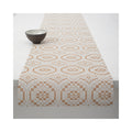 Chilewich Overshot table runner in Butterscotch, draped across a table