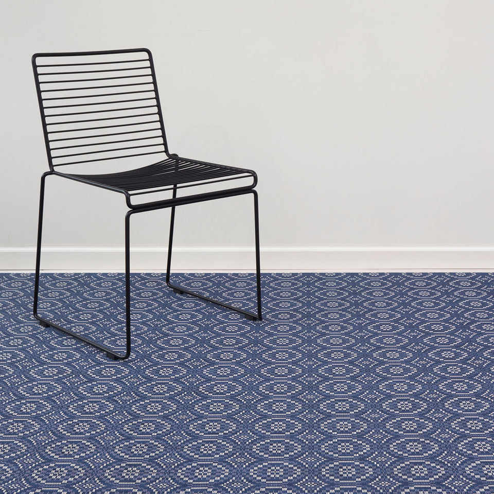Overshot / Denim woven floor mat by Chilewich, interior setting