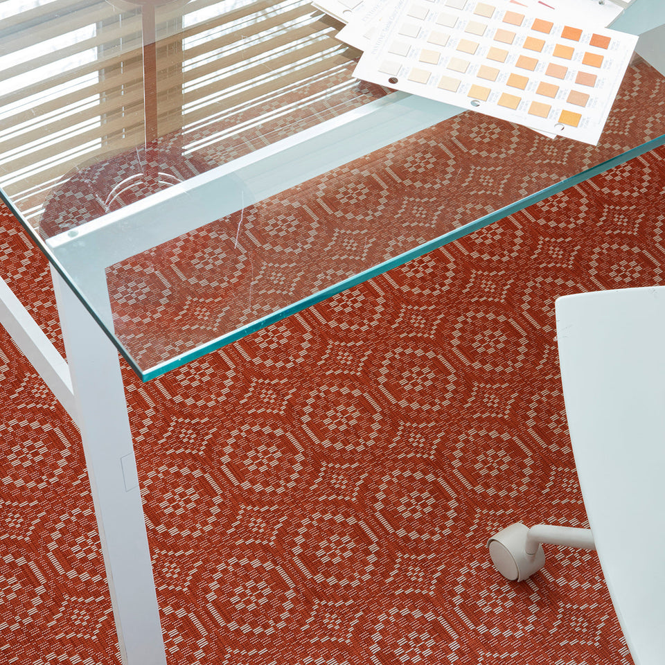 Overshot / Paprika woven floor mat by Chilewich, interior setting