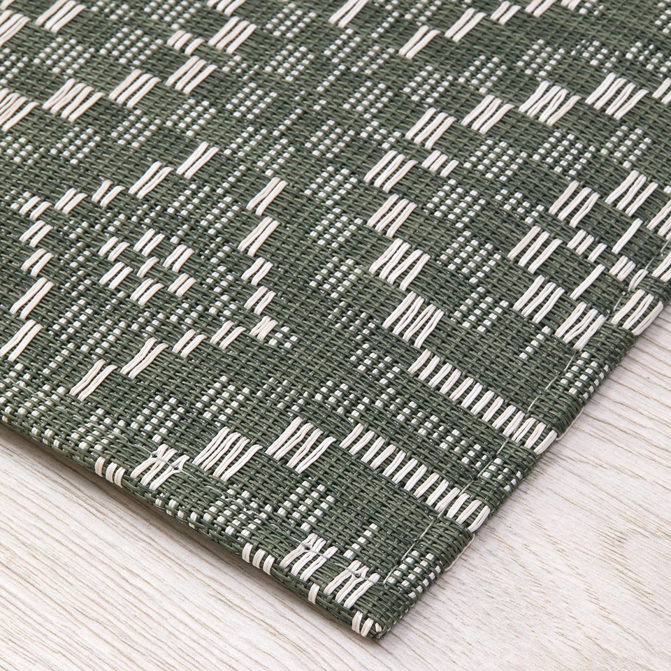 Overshot / Thyme woven floor mat by Chilewich, interior setting