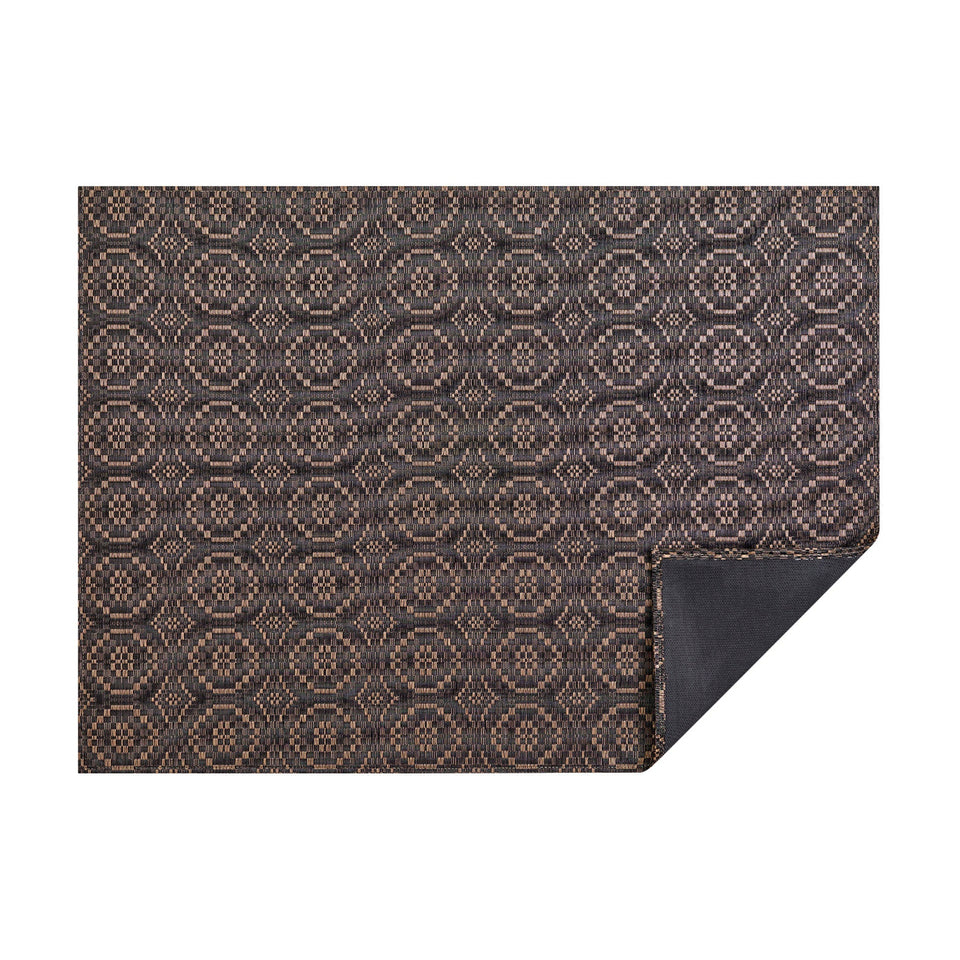 Tiger Eye Overshot woven floor mat by Chilewich, horizontal folded-corner view