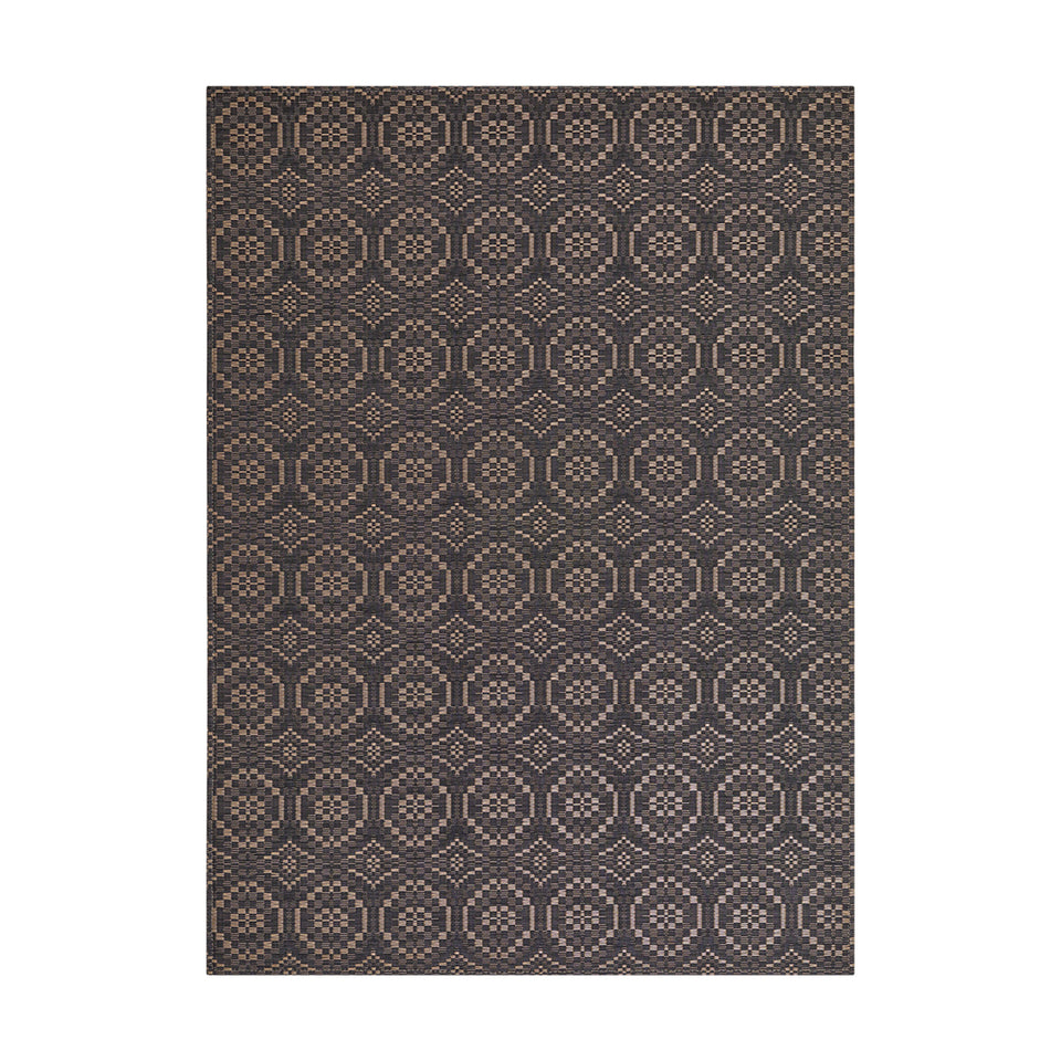 Overshot / Tiger Eye woven floor mat by Chilewich, studio view