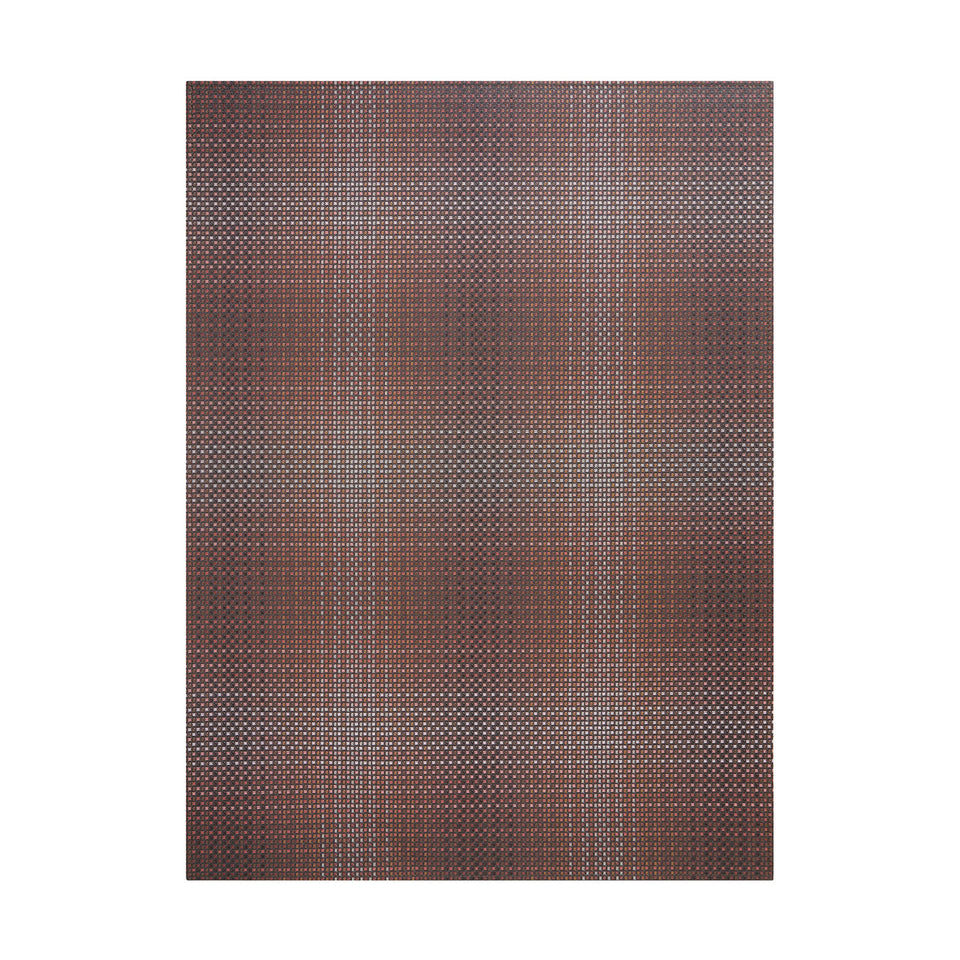Parade / Raisin woven floor mat by Chilewich, studio view