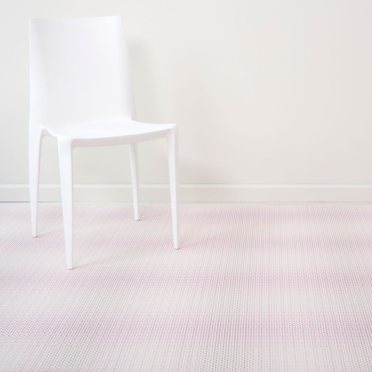 Parade / Sorbet woven floor mat by Chilewich, interior setting