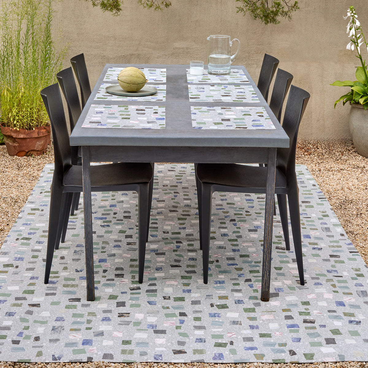 Pietra / Deep Sea woven floor mat by Chilewich, interior setting