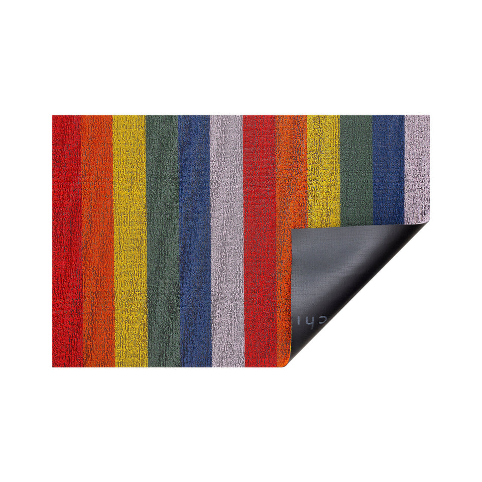 Rainbow Pride Stripe Shag Mat by Chilewich — folded corner showing the vinyl backing