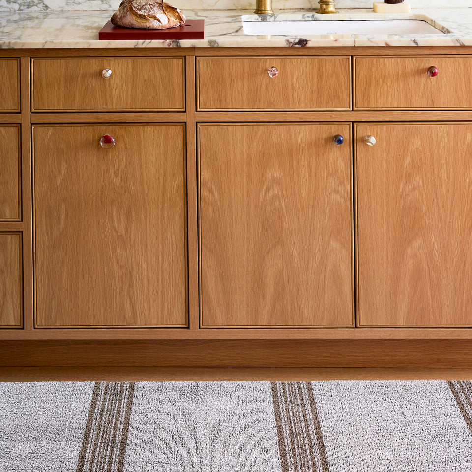 Ivory Relay Stripe Shag Mat by Chilewich — in an indoor setting