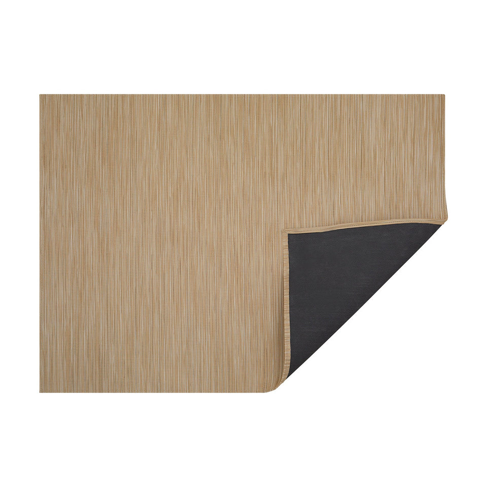 Butterscotch Rib Weave woven floor mat by Chilewich, horizontal folded-corner view
