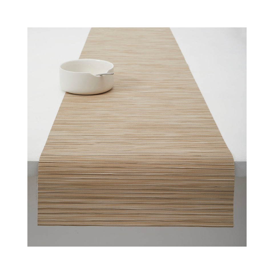 Chilewich Rib Weave table runner in Butterscotch, draped across a table