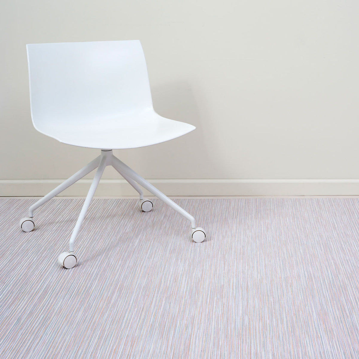 Rib Weave / Spice woven floor mat by Chilewich, interior setting