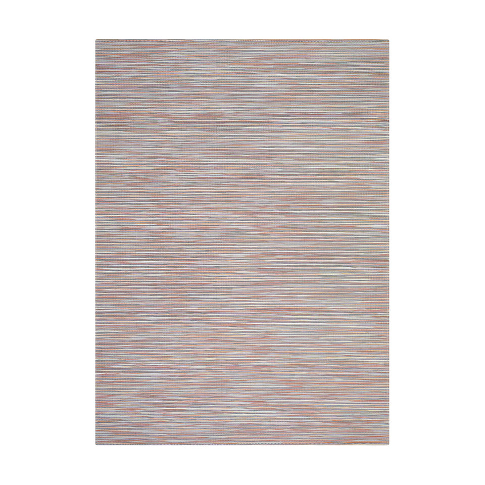 Rib Weave / Spice woven floor mat by Chilewich, studio view