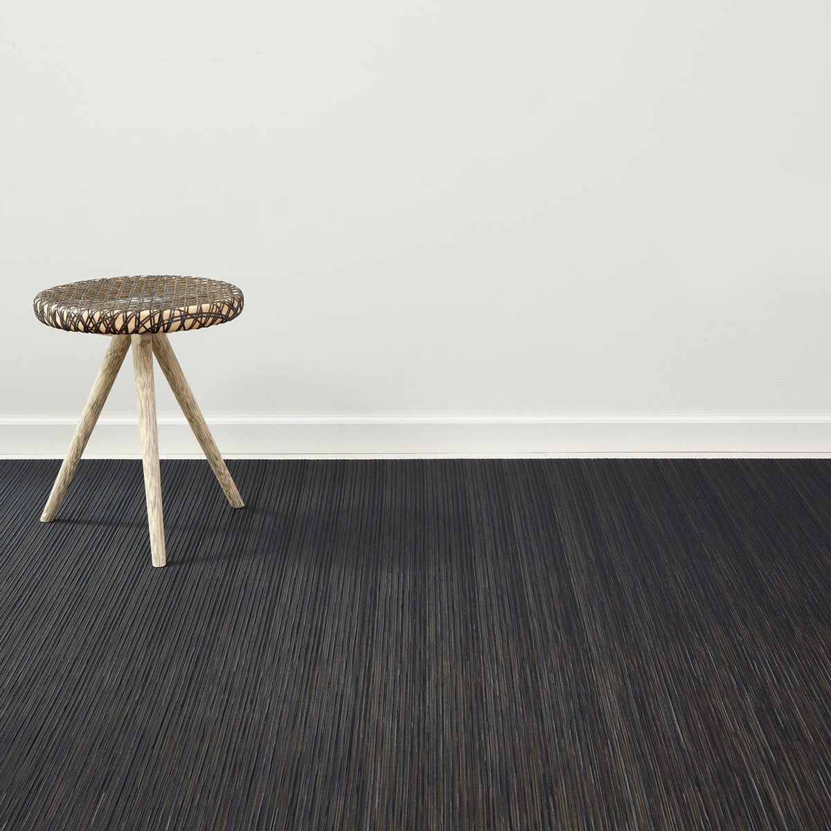Rib Weave / Tiger Eye woven floor mat by Chilewich, interior setting