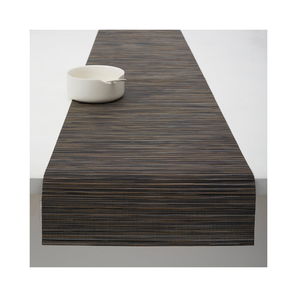 Chilewich Rib Weave table runner in Tiger Eye, draped across a table