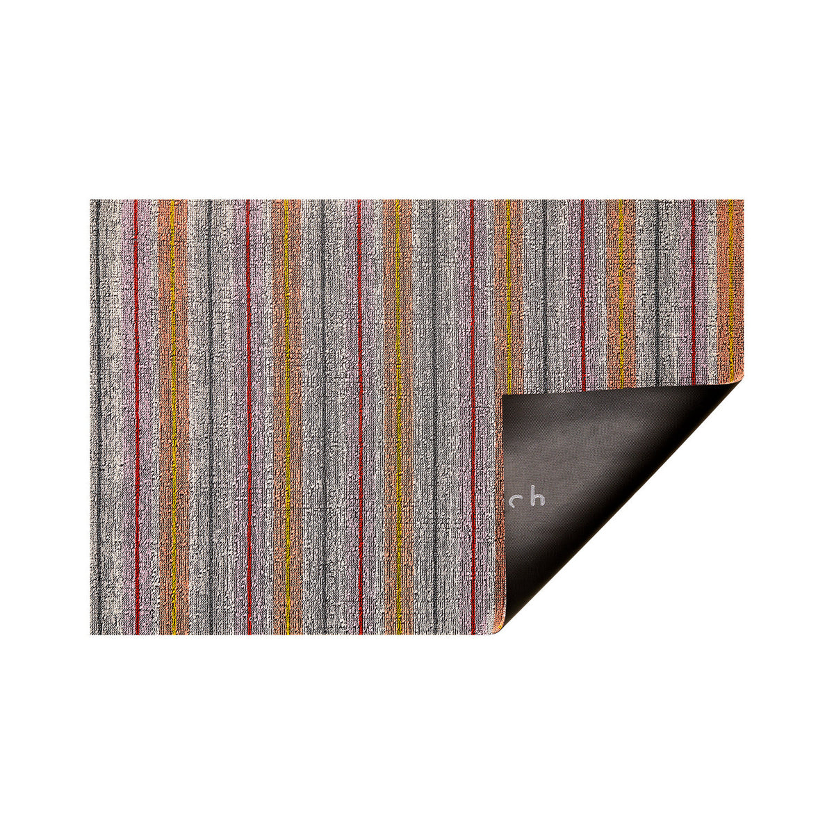Bon Bon Ribbon Stripe Shag Mat by Chilewich — folded corner showing the vinyl backing