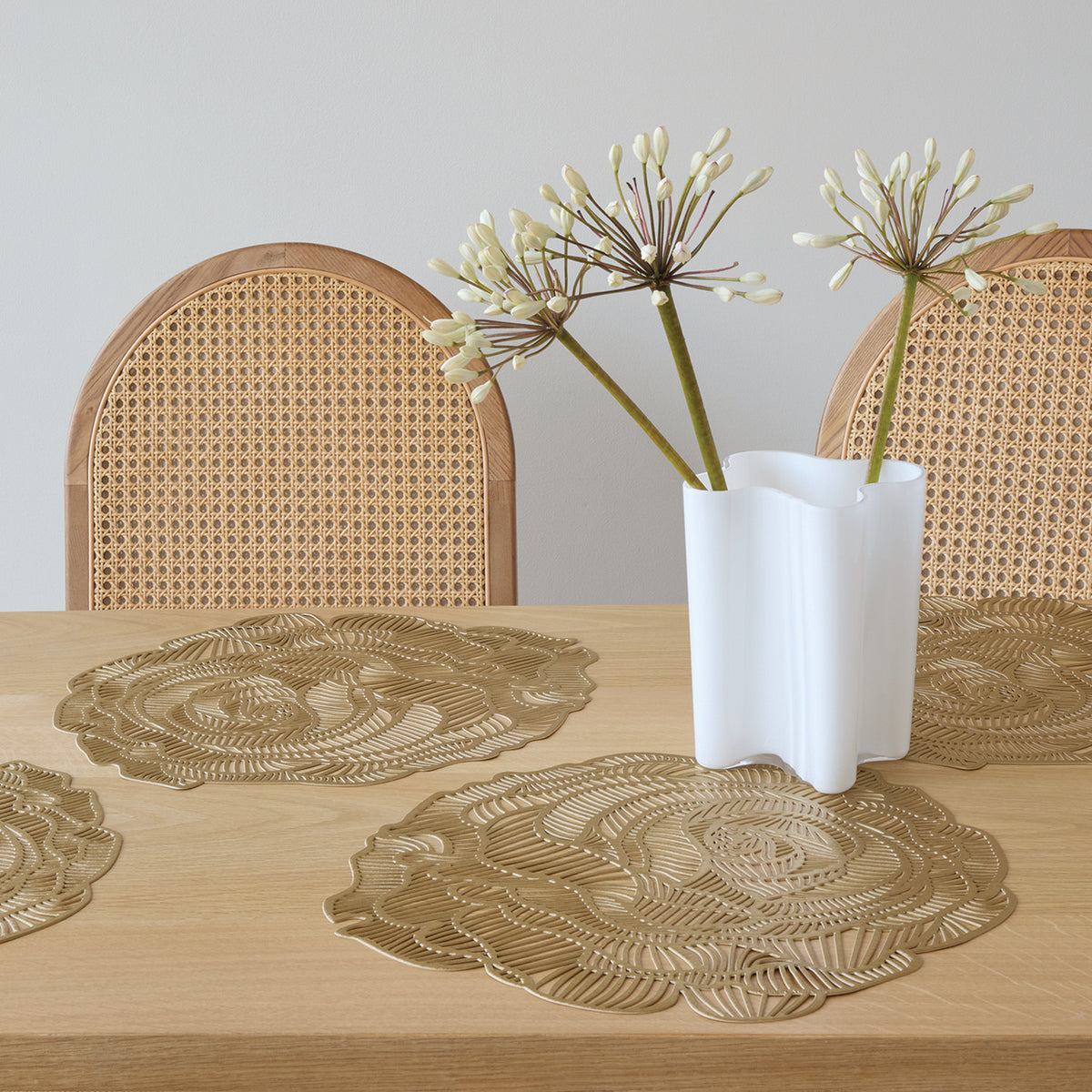 Chilewich Rose in Brass, shown in a styled table setting