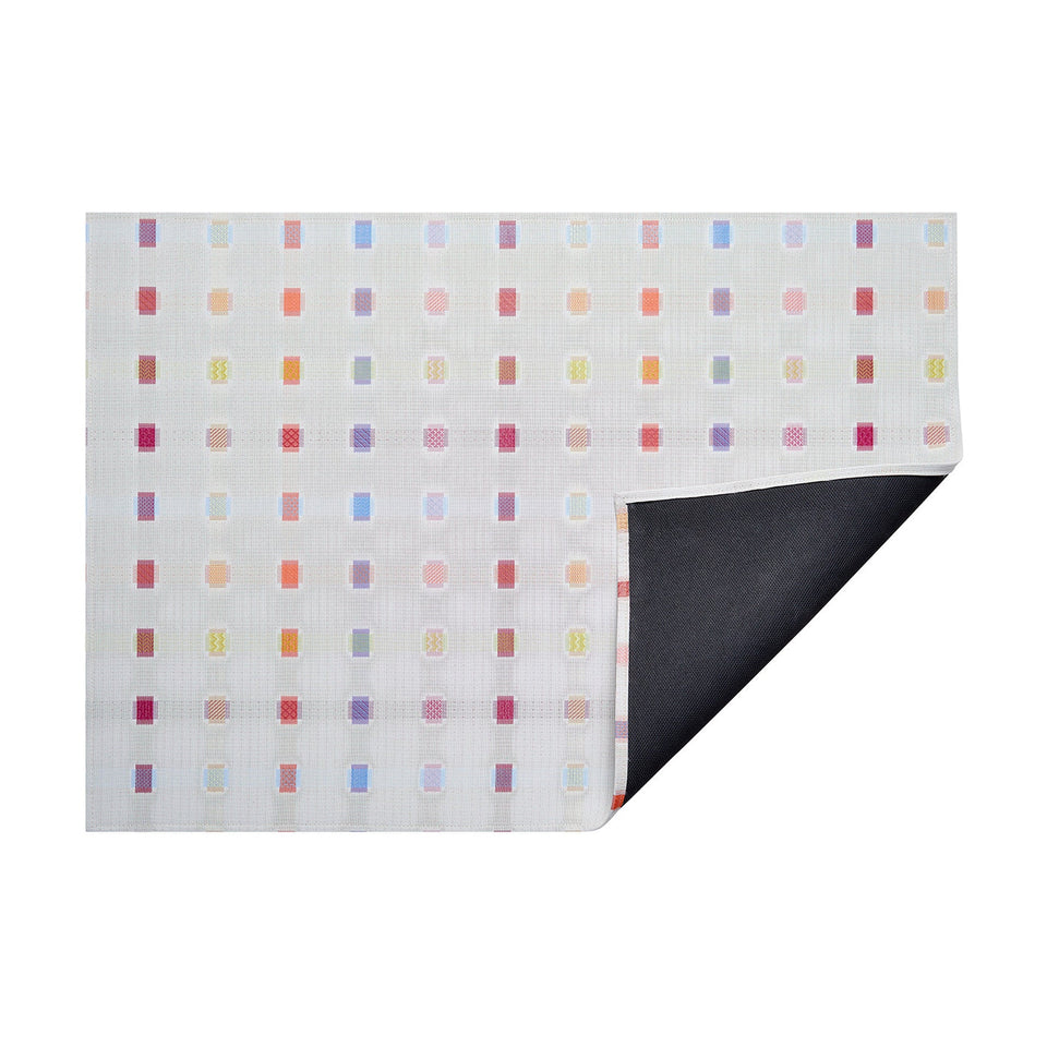 Multi Sampler woven floor mat by Chilewich, horizontal folded-corner view