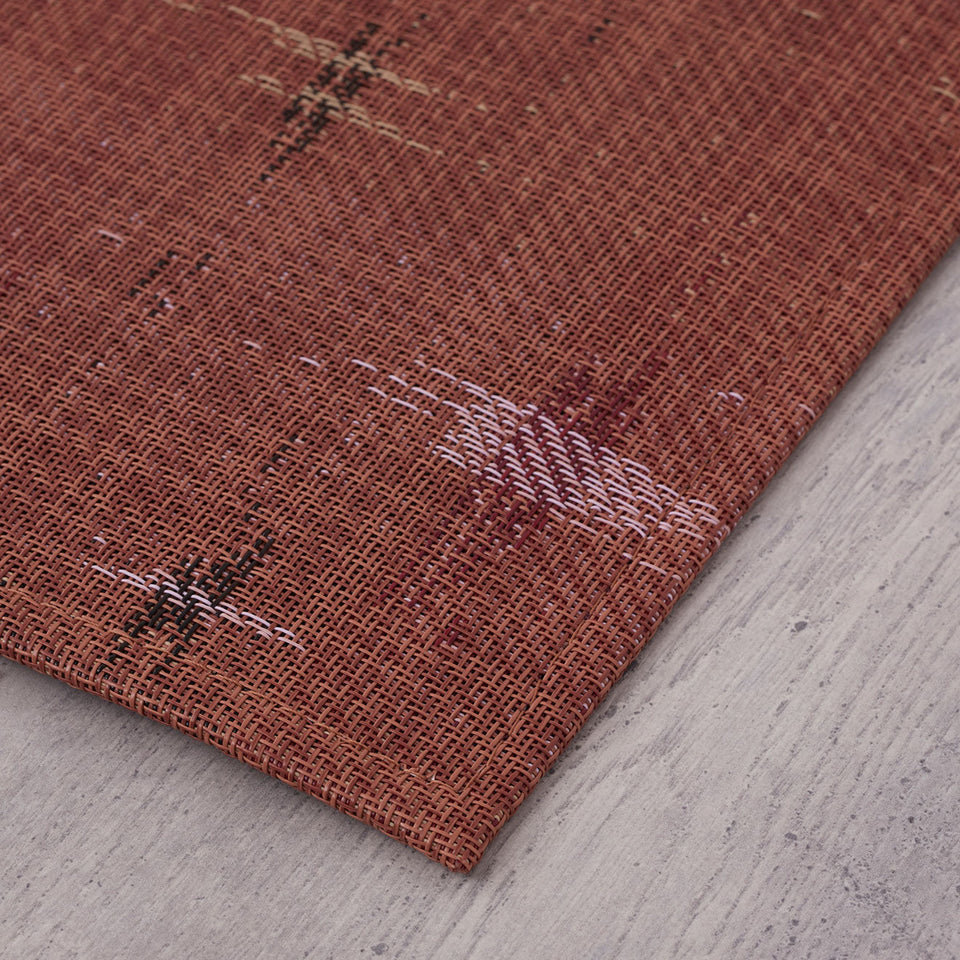 Spark / Cider woven floor mat by Chilewich, interior setting