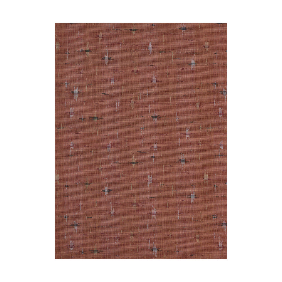 Spark / Cider woven floor mat by Chilewich, studio view