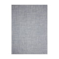 Thatch / Rain woven floor mat by Chilewich, studio view