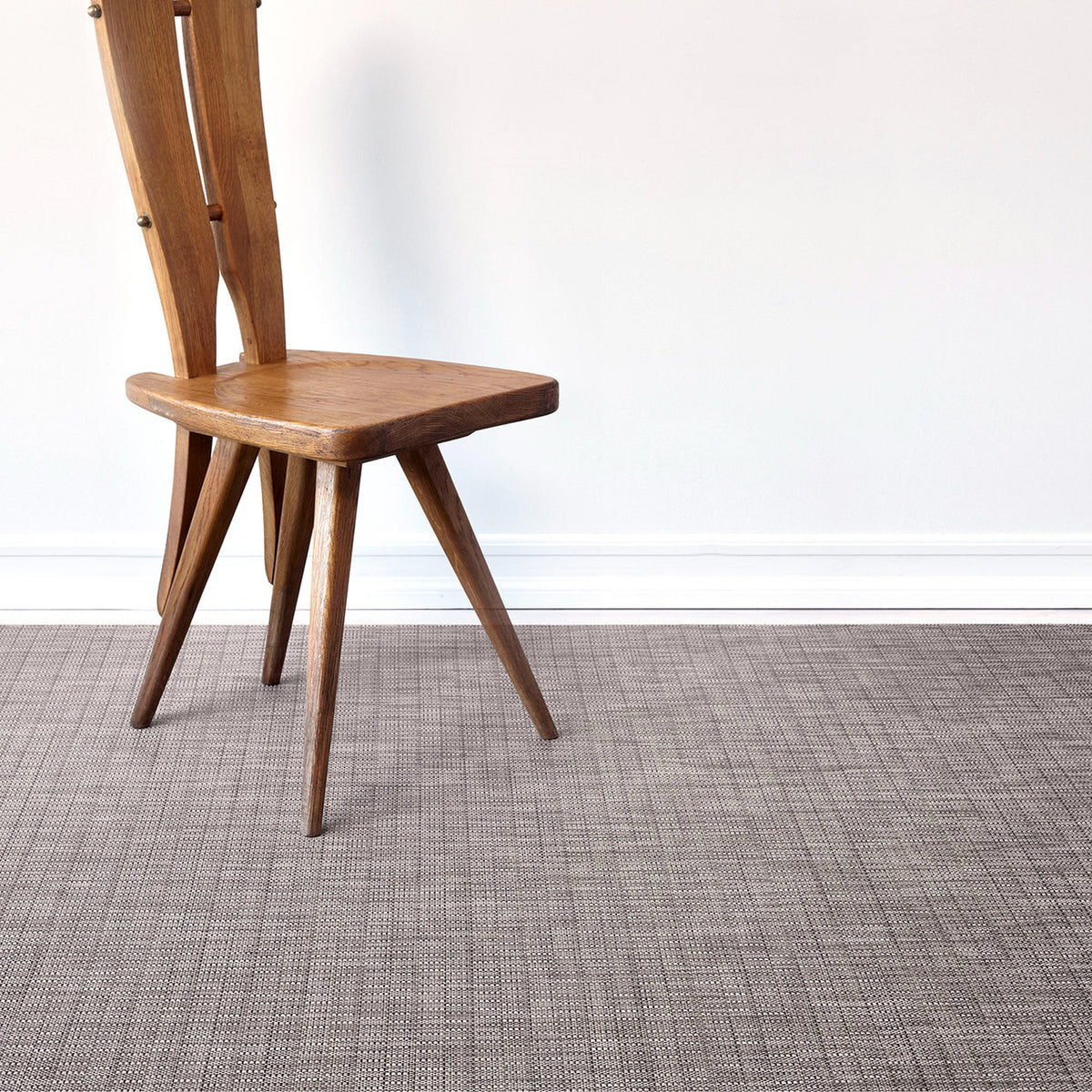 Thatch / Umber woven floor mat by Chilewich, interior setting