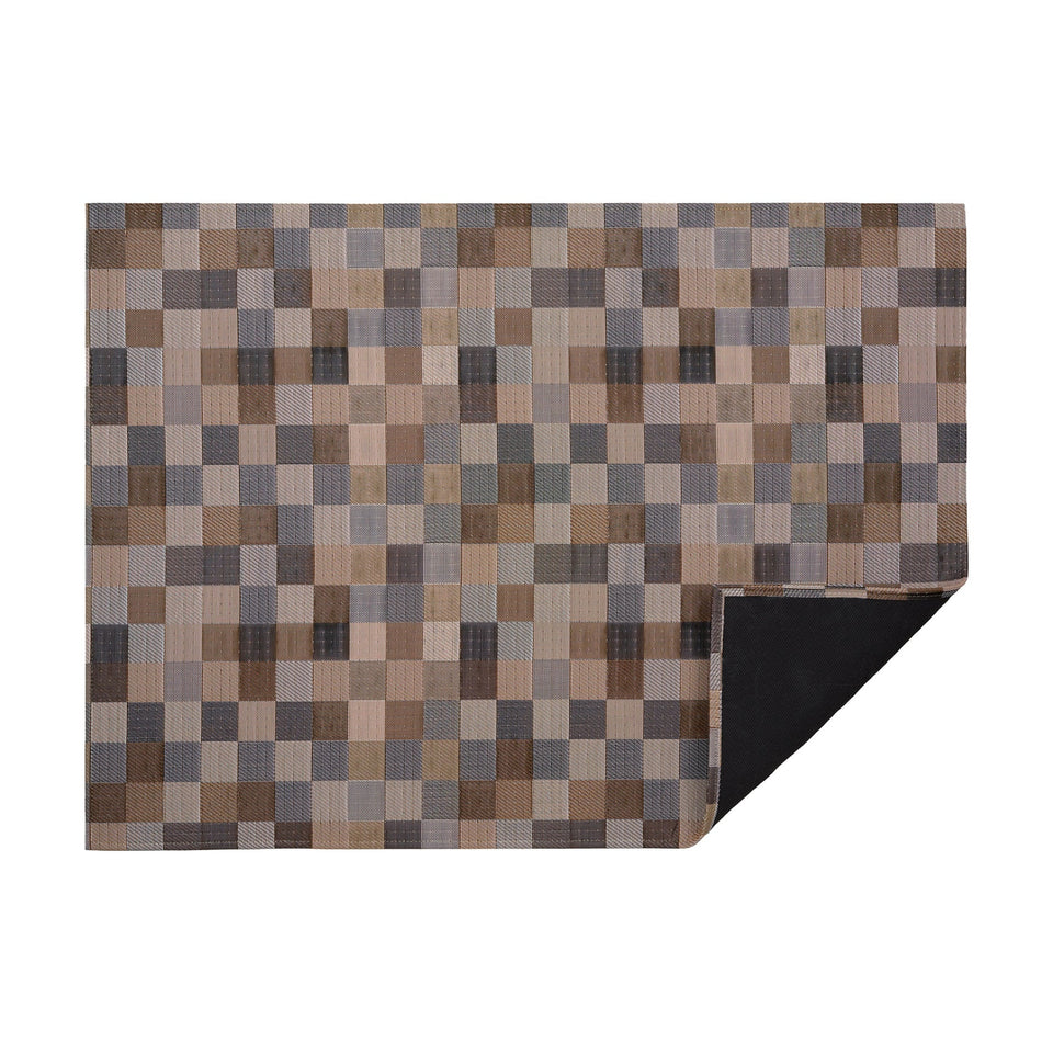 Mink Tint woven floor mat by Chilewich, horizontal folded-corner view