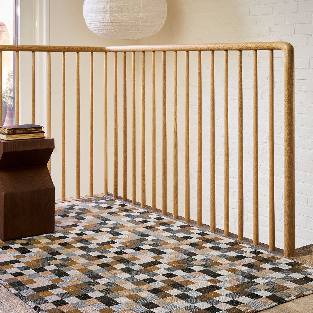 Tint / Mink woven floor mat by Chilewich, interior setting