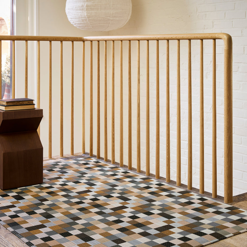 Tint / Mink woven floor mat by Chilewich, interior setting