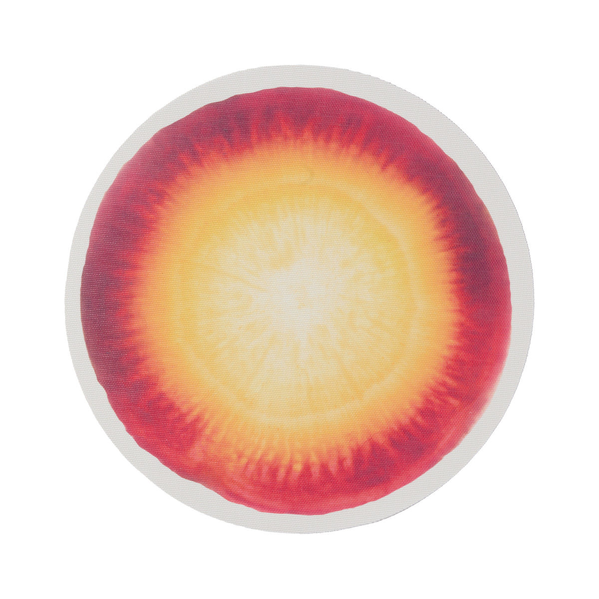 Chilewich Vegetables round placemat in Carrot, viewed from above on a white background