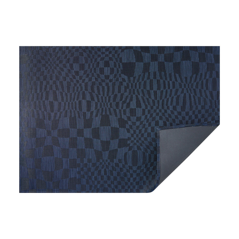 Ocean Warp woven floor mat by Chilewich, horizontal folded-corner view