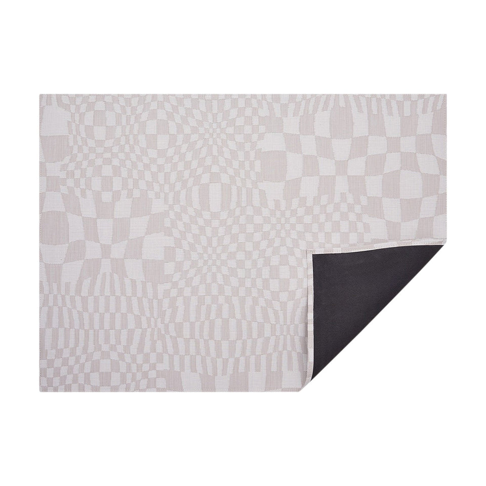 Sand Warp woven floor mat by Chilewich, horizontal folded-corner view